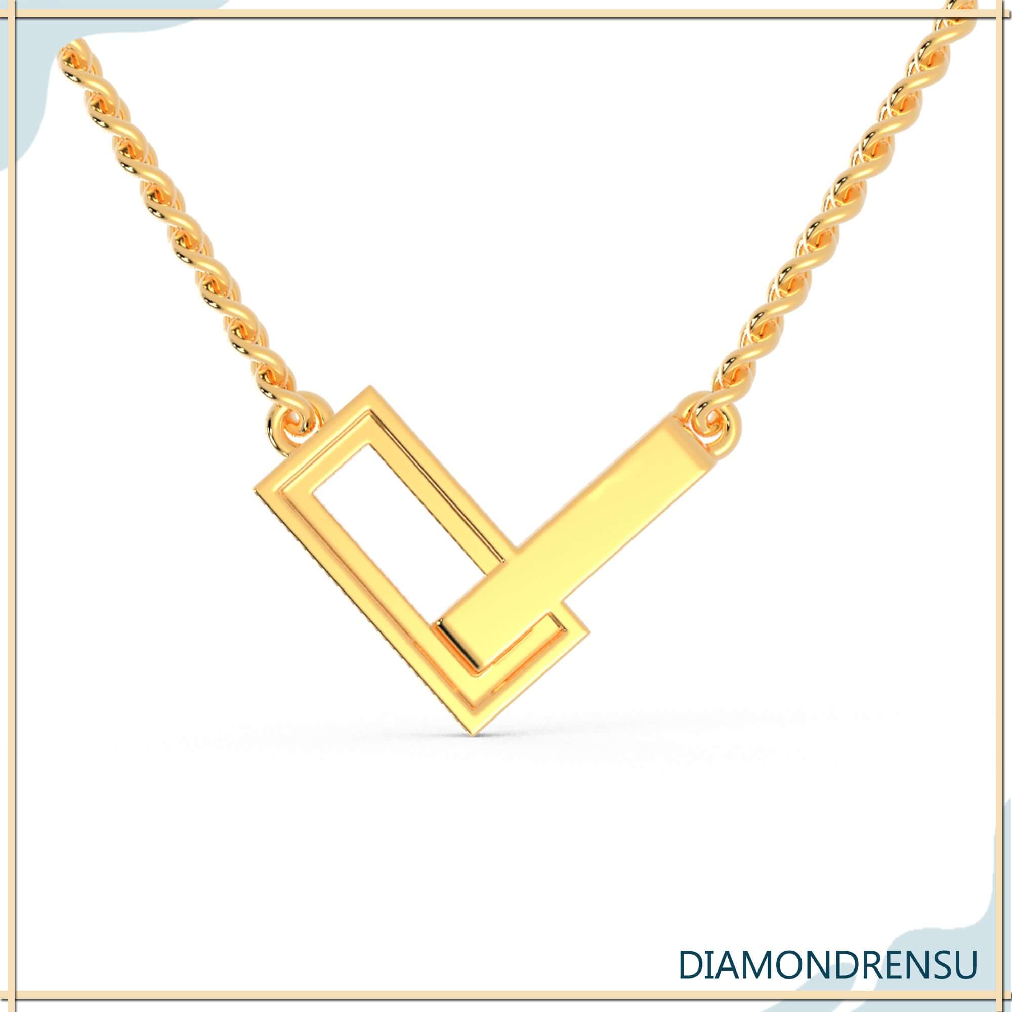 Diamondrensu UK pendant with V shaped gold frame and diamond.
