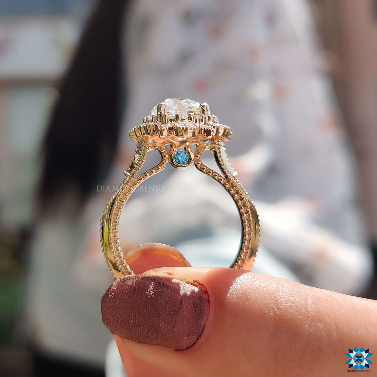Custom engagement ring with round old European cut moissanite.