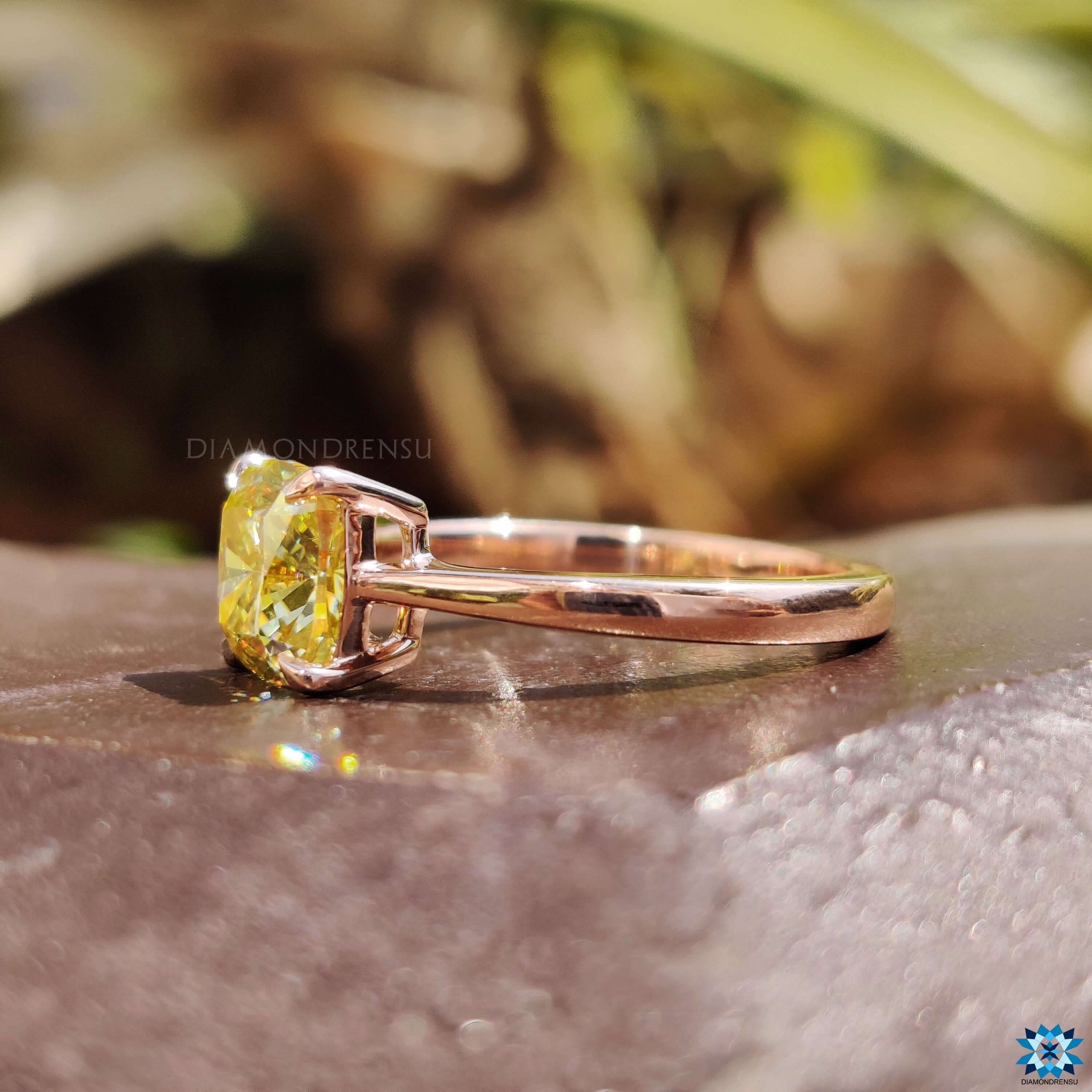 Solitaire setting ring with cushion cut center stone.