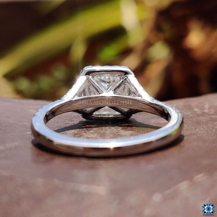 White gold moissanite engagement ring.