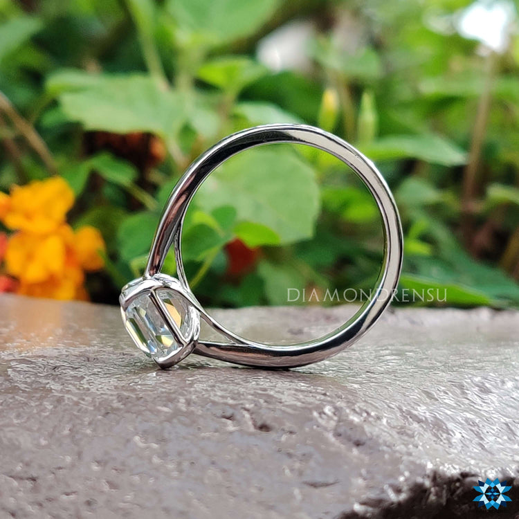 Buy custom moissanite solitaire ring in white gold.