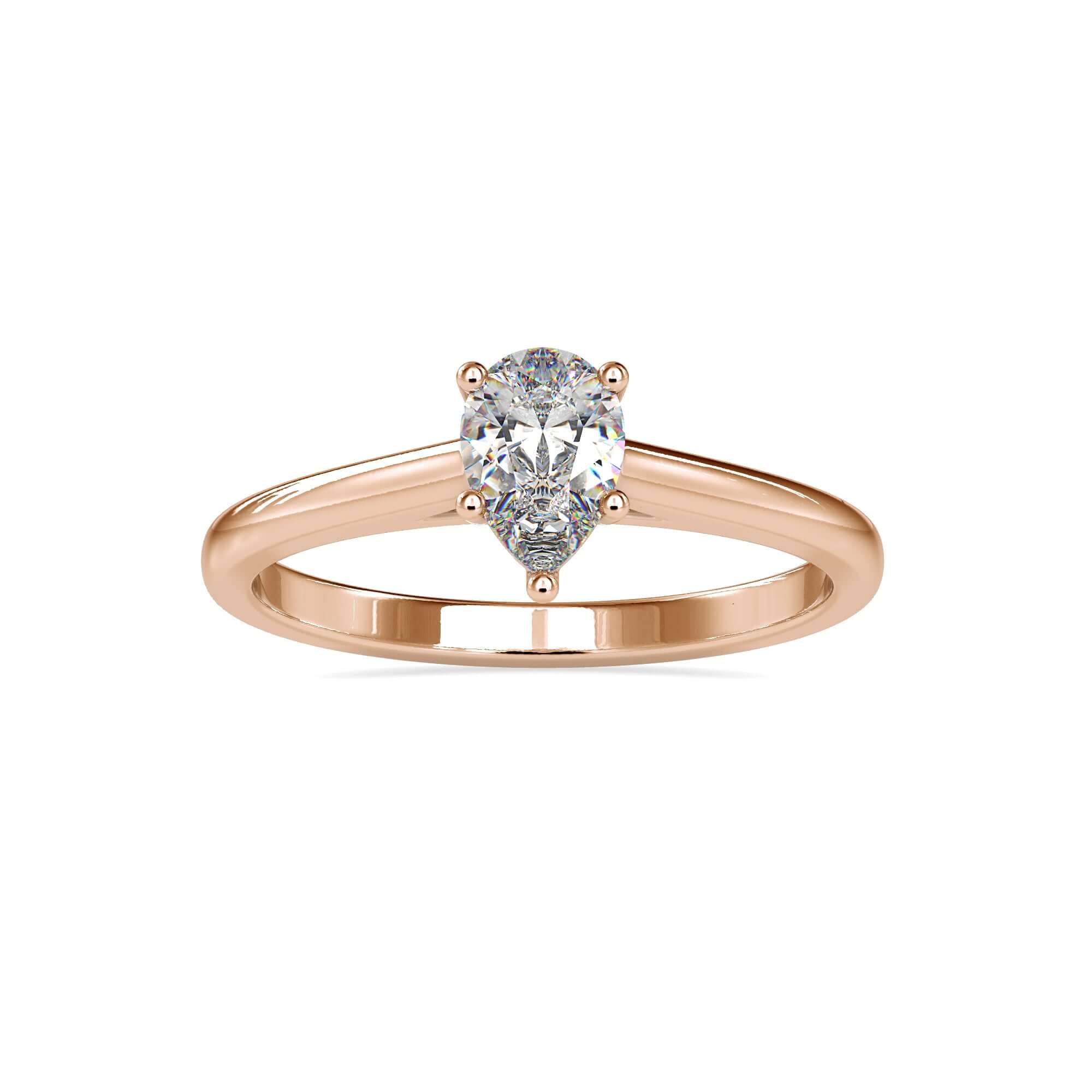 White gold cathedral ring with pear diamond setting.