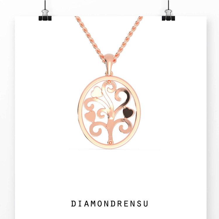 Unique diamond pendant shaped as a tree of life in gold.