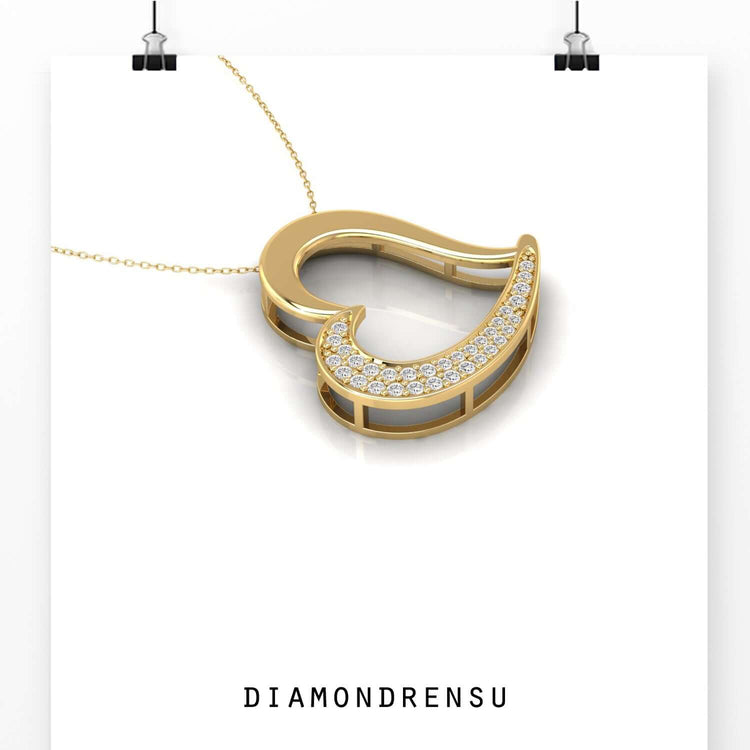 A heart pendant featuring lab grown diamond in white gold.
