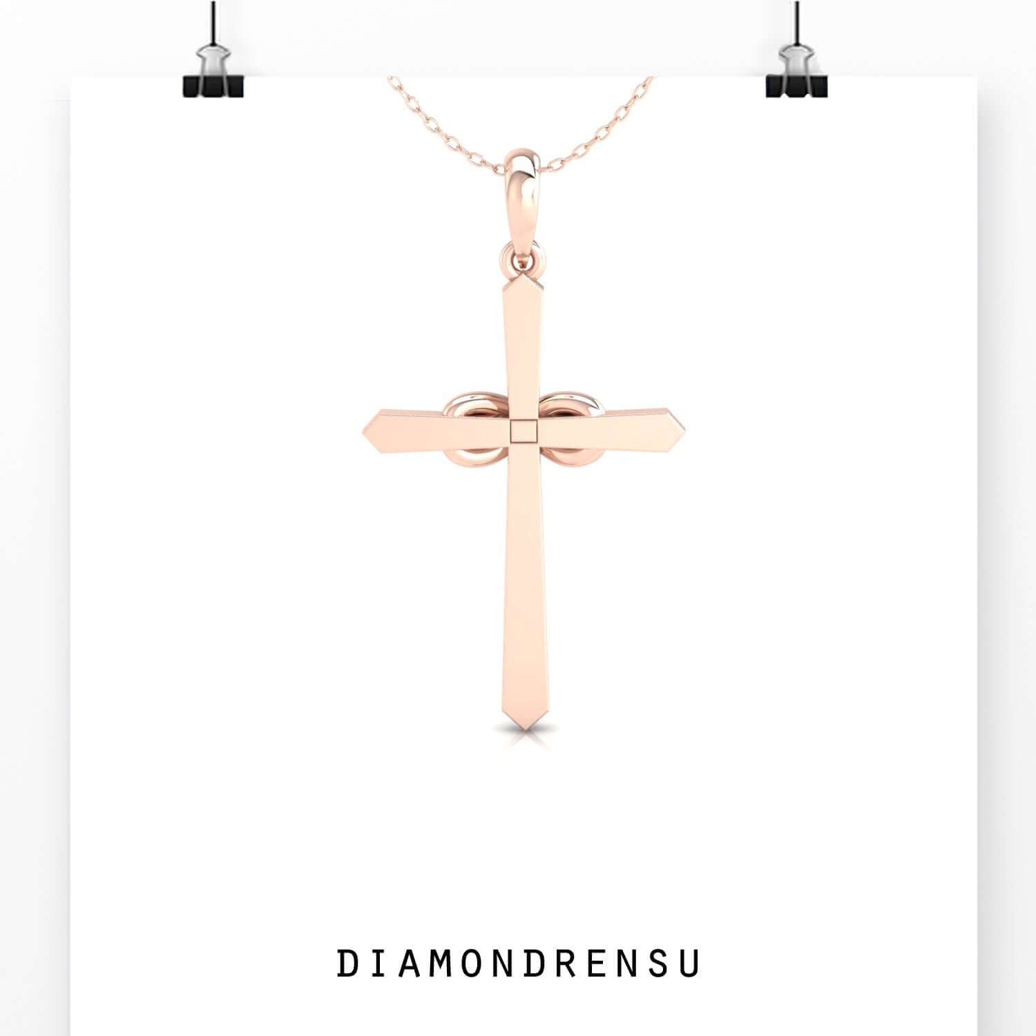 Infinity cross pendant in yellow gold with handcrafted detail.