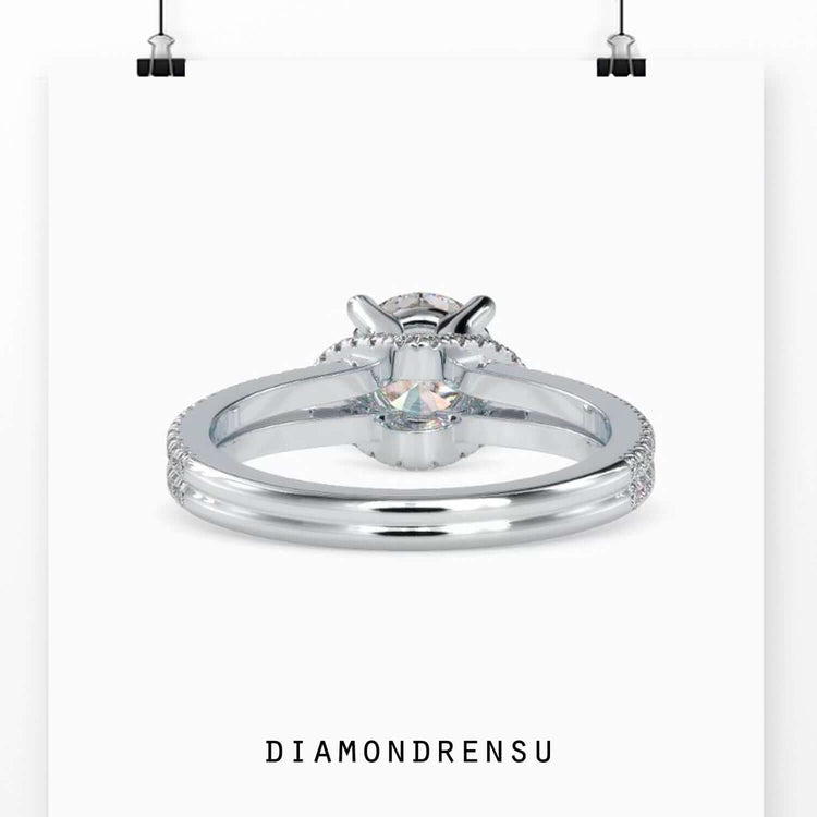 Custom design ring with round diamond and pave halo.