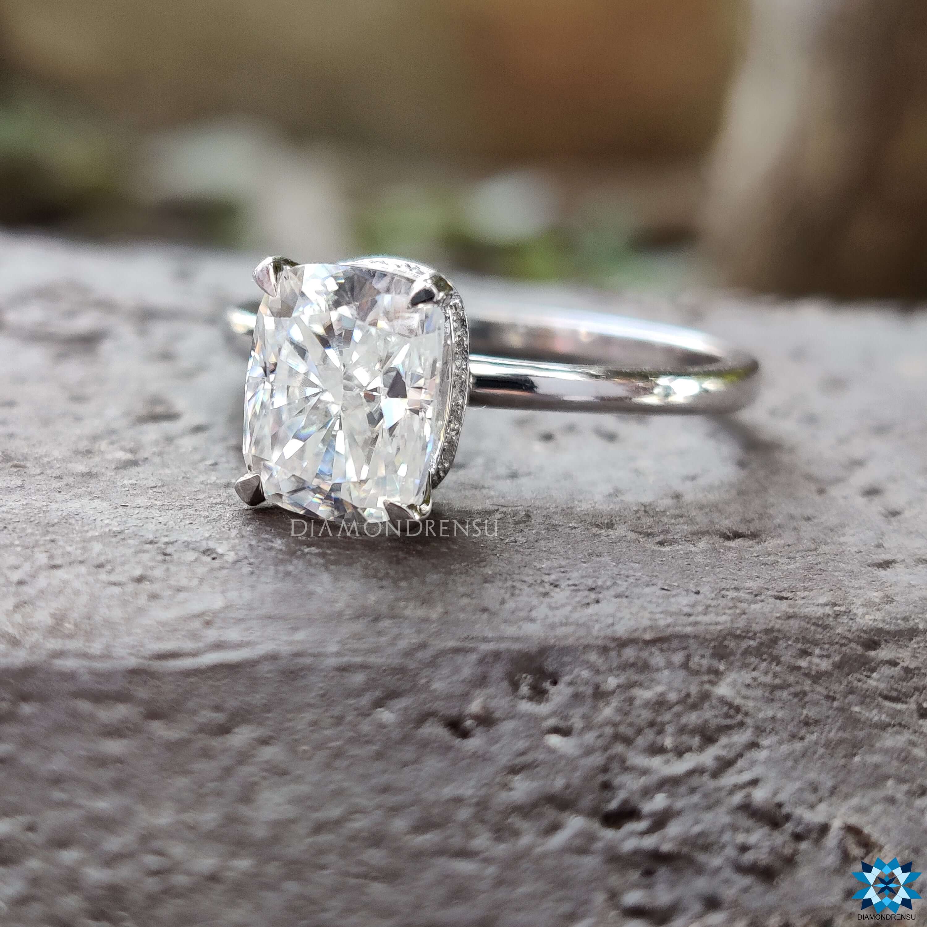 Custom engagement ring with cushion moissanite.
