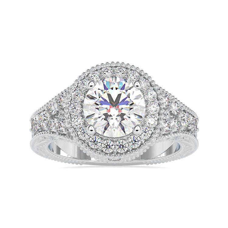 Handmade peekaboo engagement ring with halo design.
