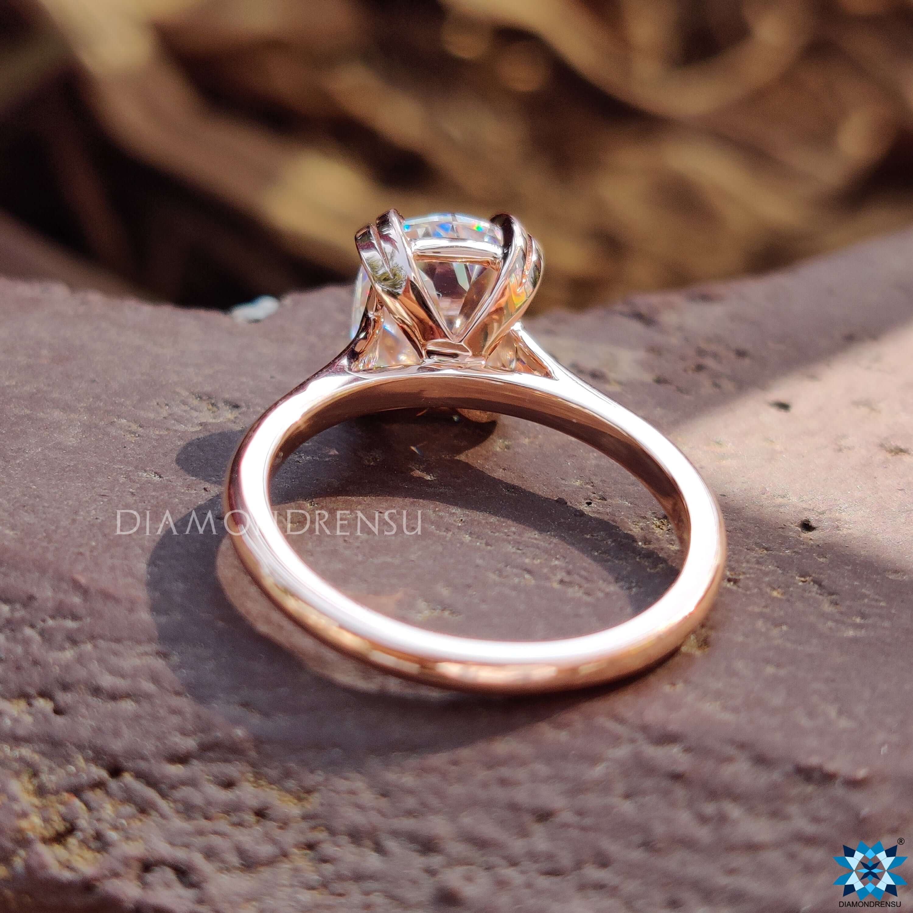 Diamondrensu UK cushion OEC solitaire moissanite ring.