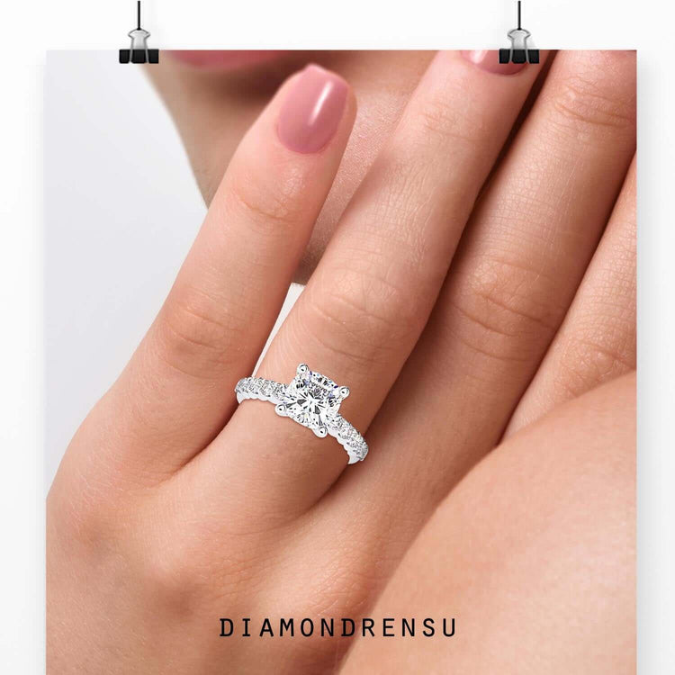 Pave setting ring with lab grown cushion cut diamond.