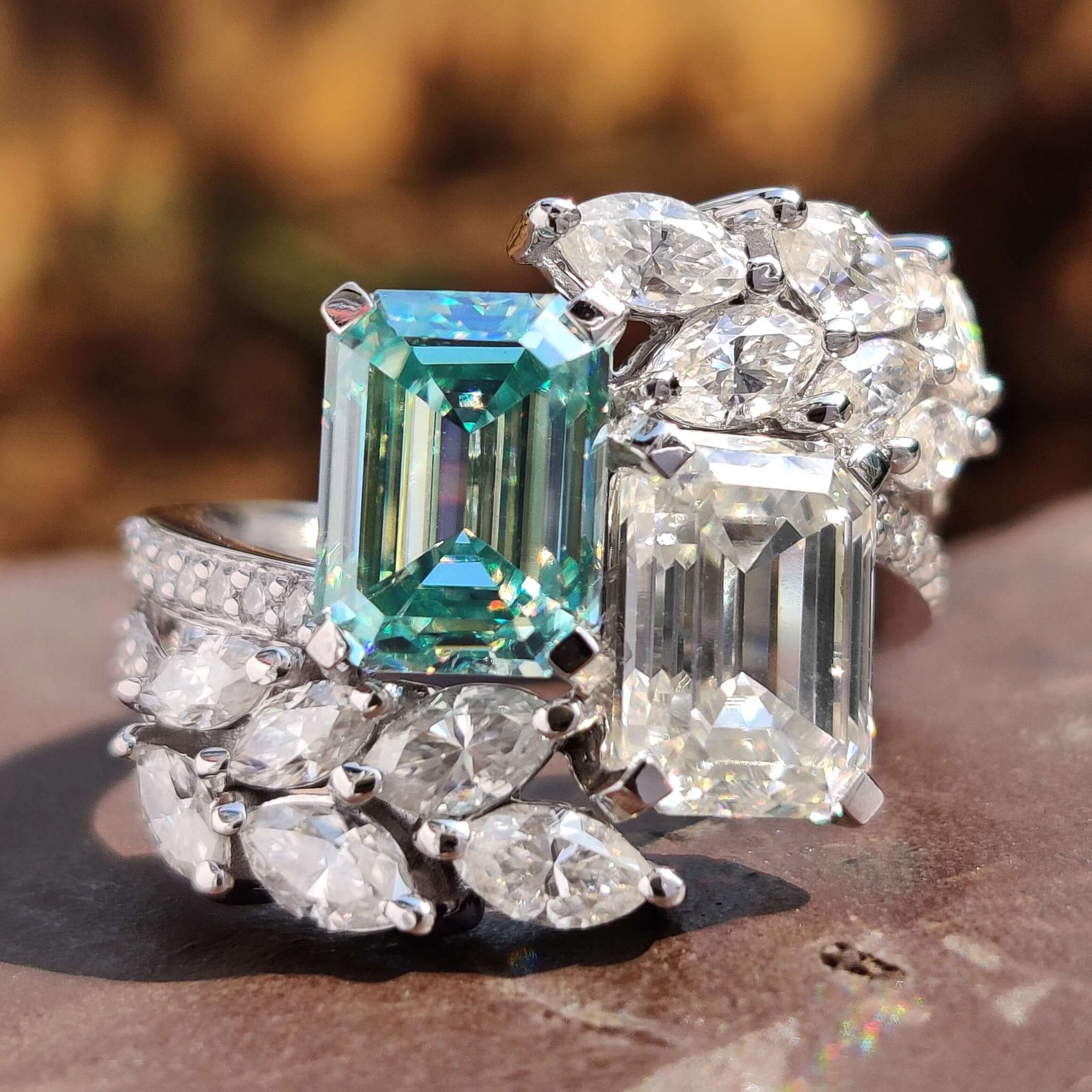 Emerald cut moissanite engagement ring in white gold.