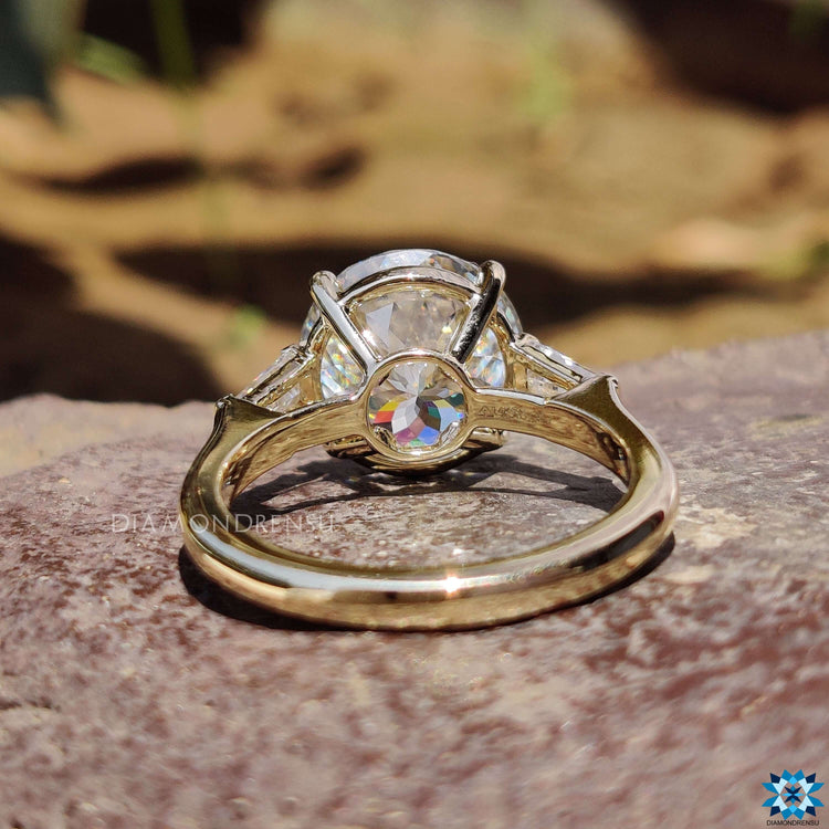 Custom engagement ring with three stone design.