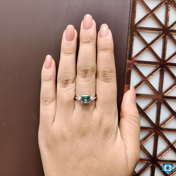 Handmade moissanite ring in white gold.