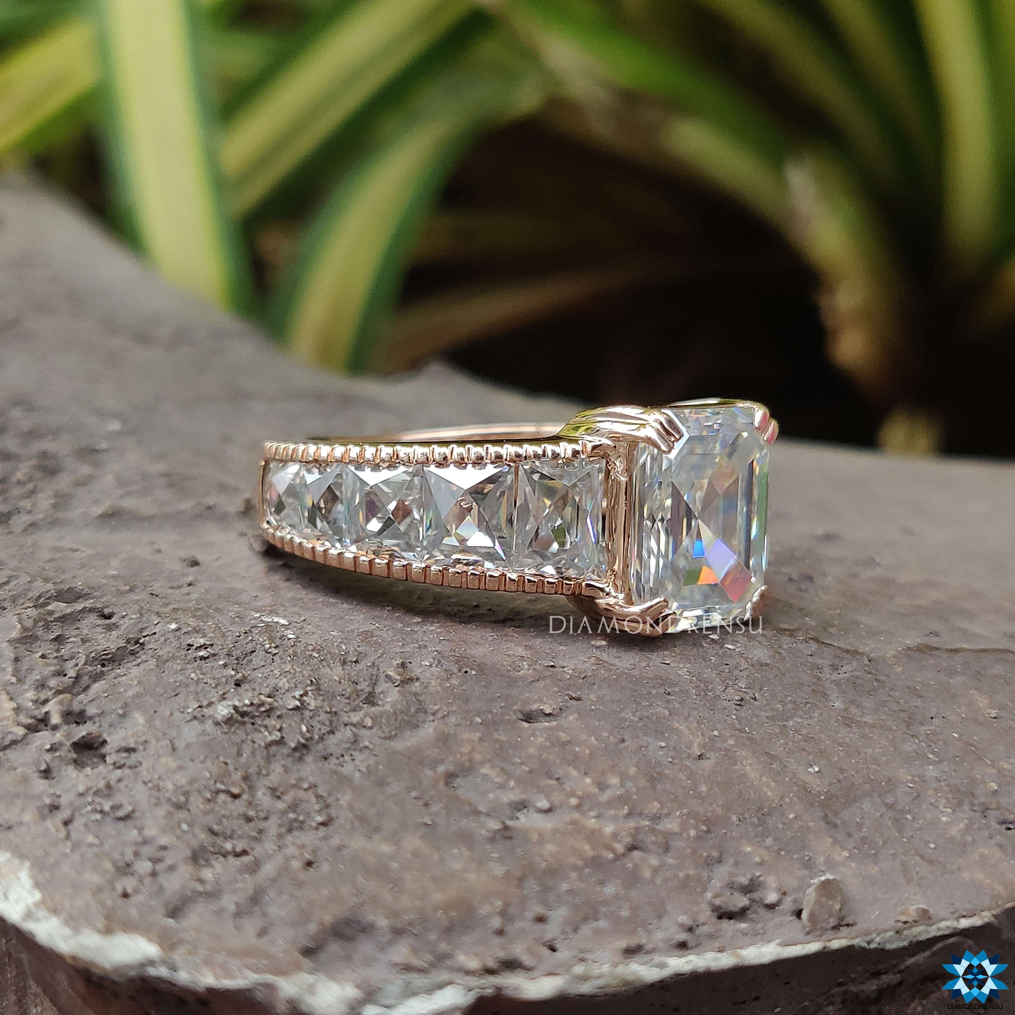Rose gold emerald cut engagement ring.