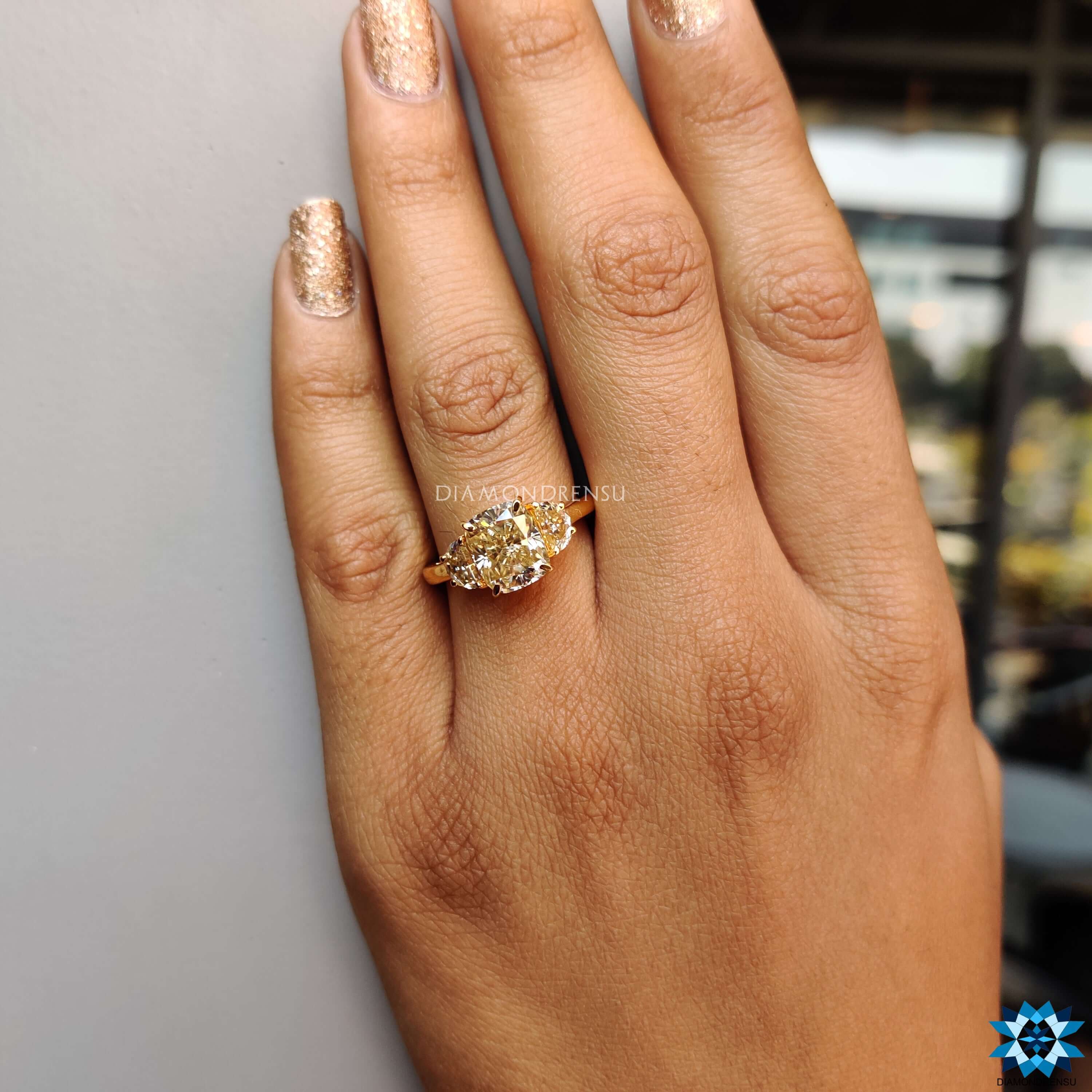 Custom engagement ring with cushion cut moissanite.