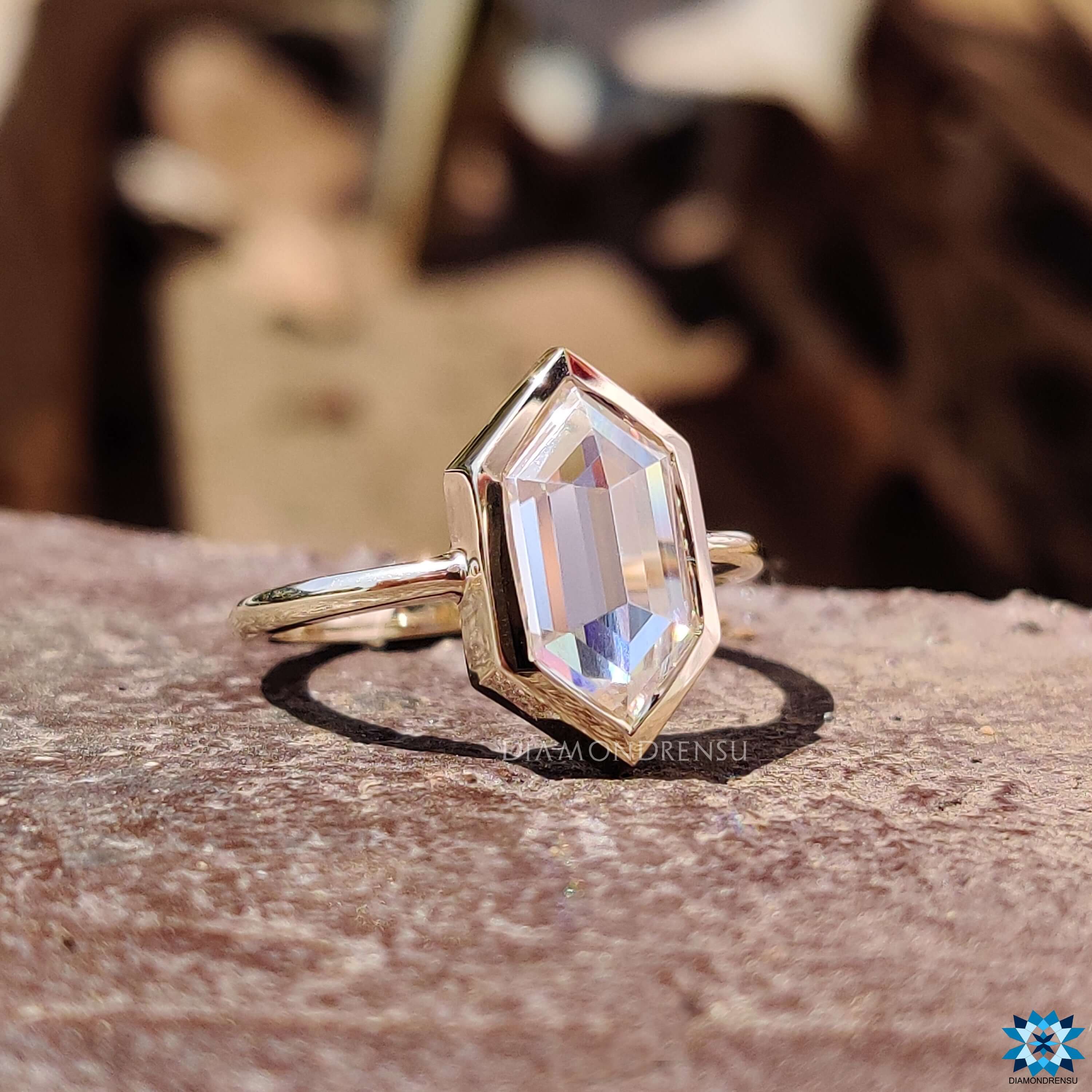 Handmade bezel set hexagon rose cut engagement ring.