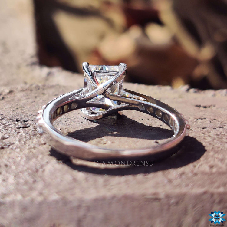 Shop to buy engagement ring featuring a radiant cut ring in classic white gold.