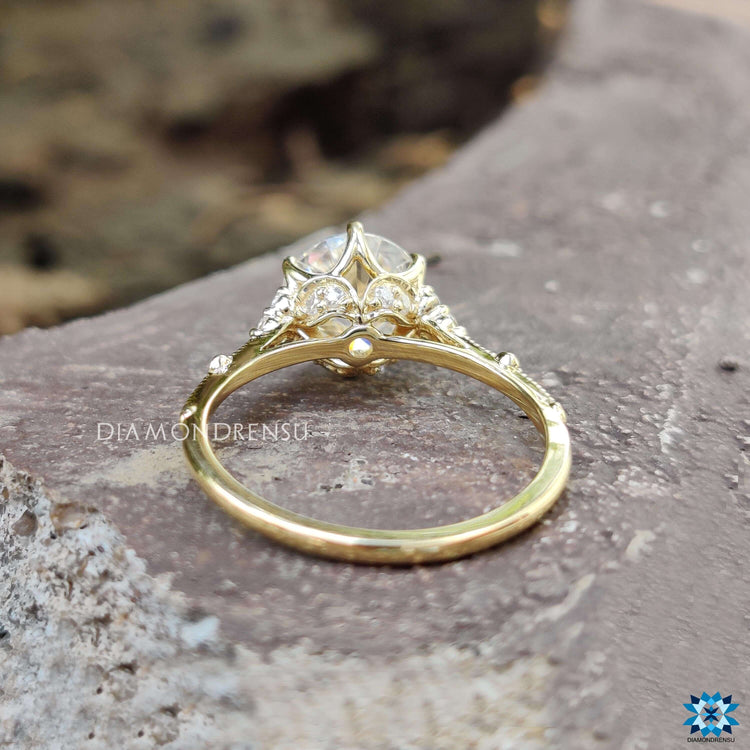 Custom vintage-inspired moissanite engagement ring.