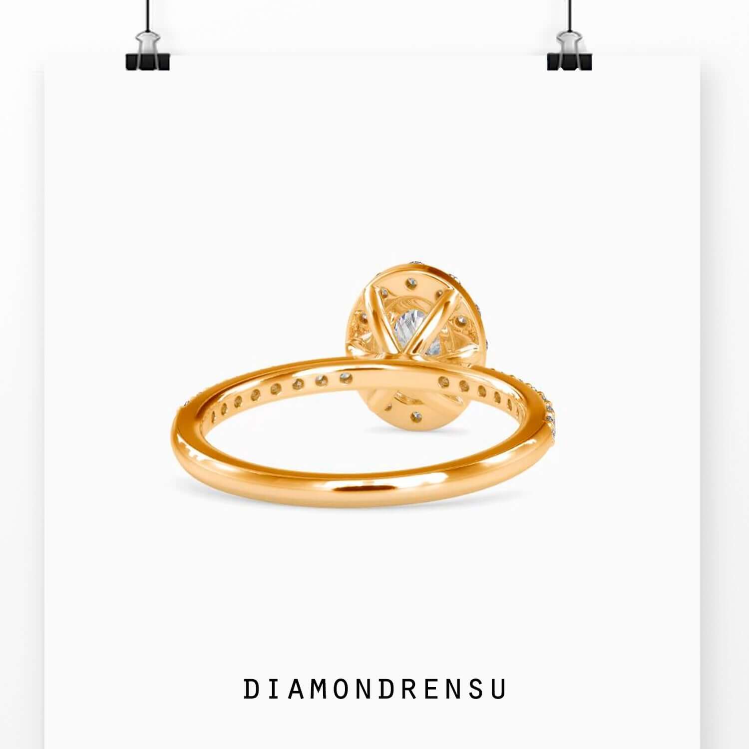 Lab grown diamond ring featuring oval cut and pave band.