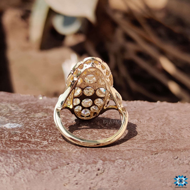 Handmade ring with rose cut moissanite stone.