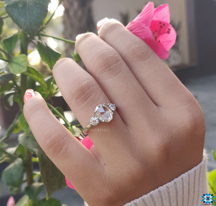 White gold engagement ring with an oval shaped center stone for brilliance.