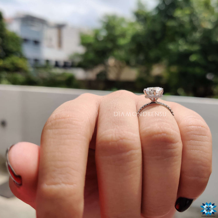 Diamondrensu UK white gold hidden halo moissanite ring.
