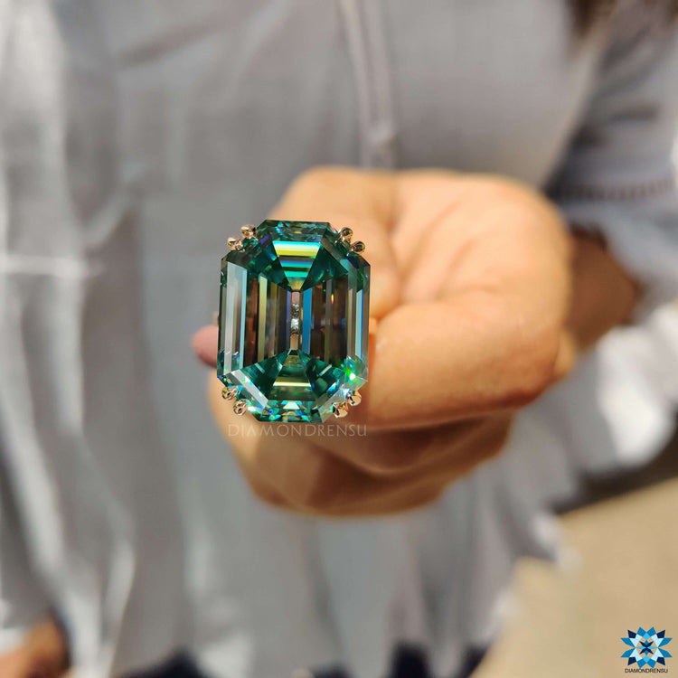 Buy moissanite ring with cyan blue center stone.