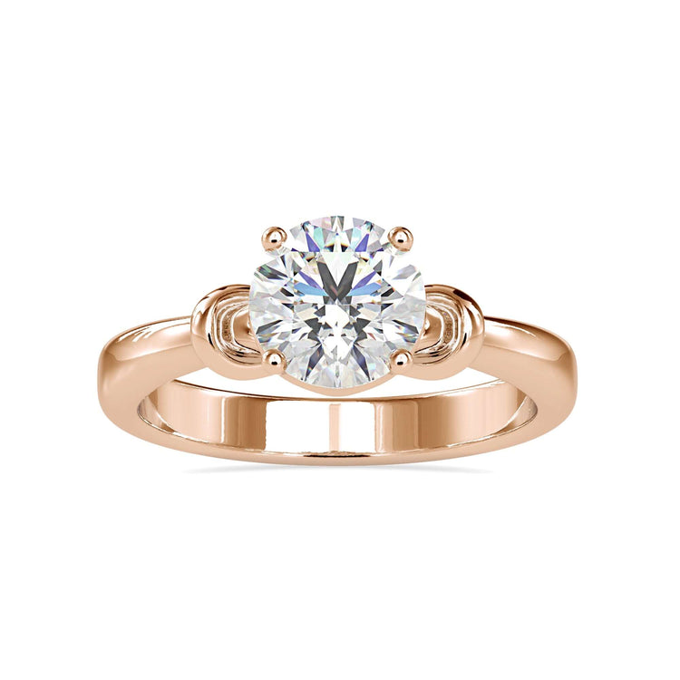 Lab grown diamond engagement ring with round solitaire and infinity design.