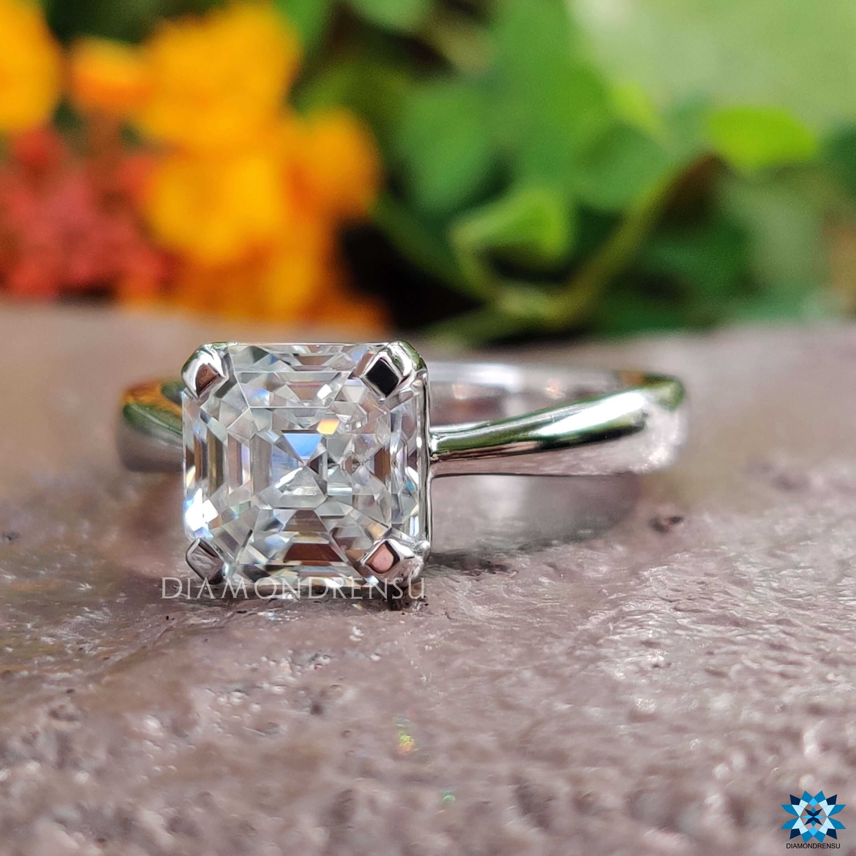 Handmade octavia cut solitaire ring with tapered band.