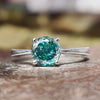Portuguese moissanite ring with tapered shank band.