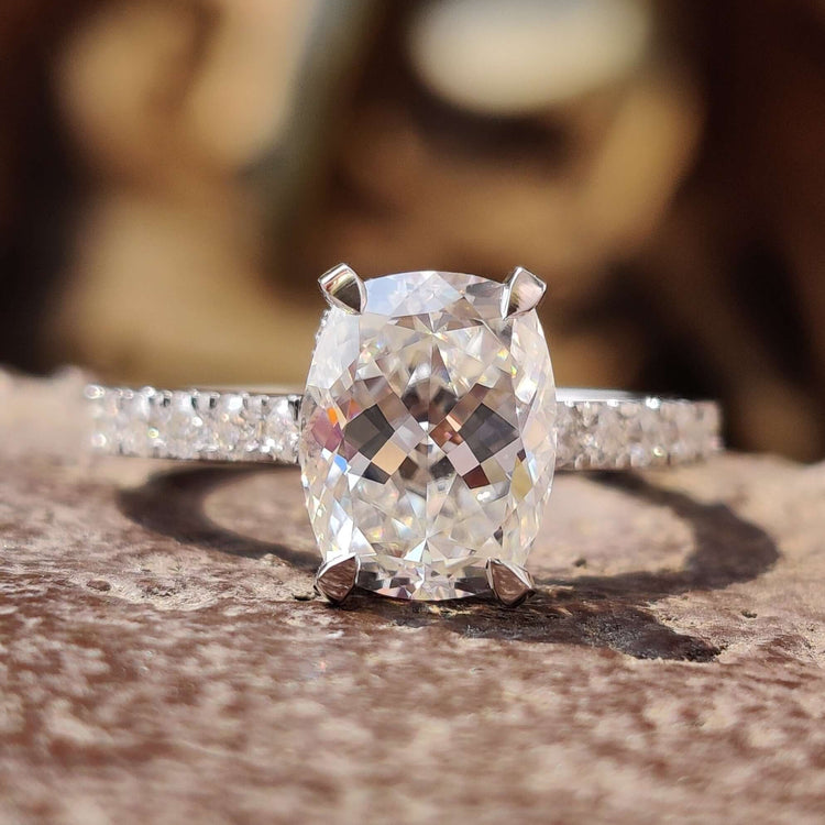 Pave band engagement ring with round cut stones.