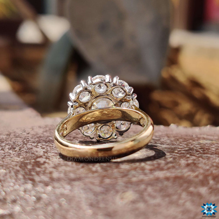 Two-tone moissanite ring with prong setting and vintage style.