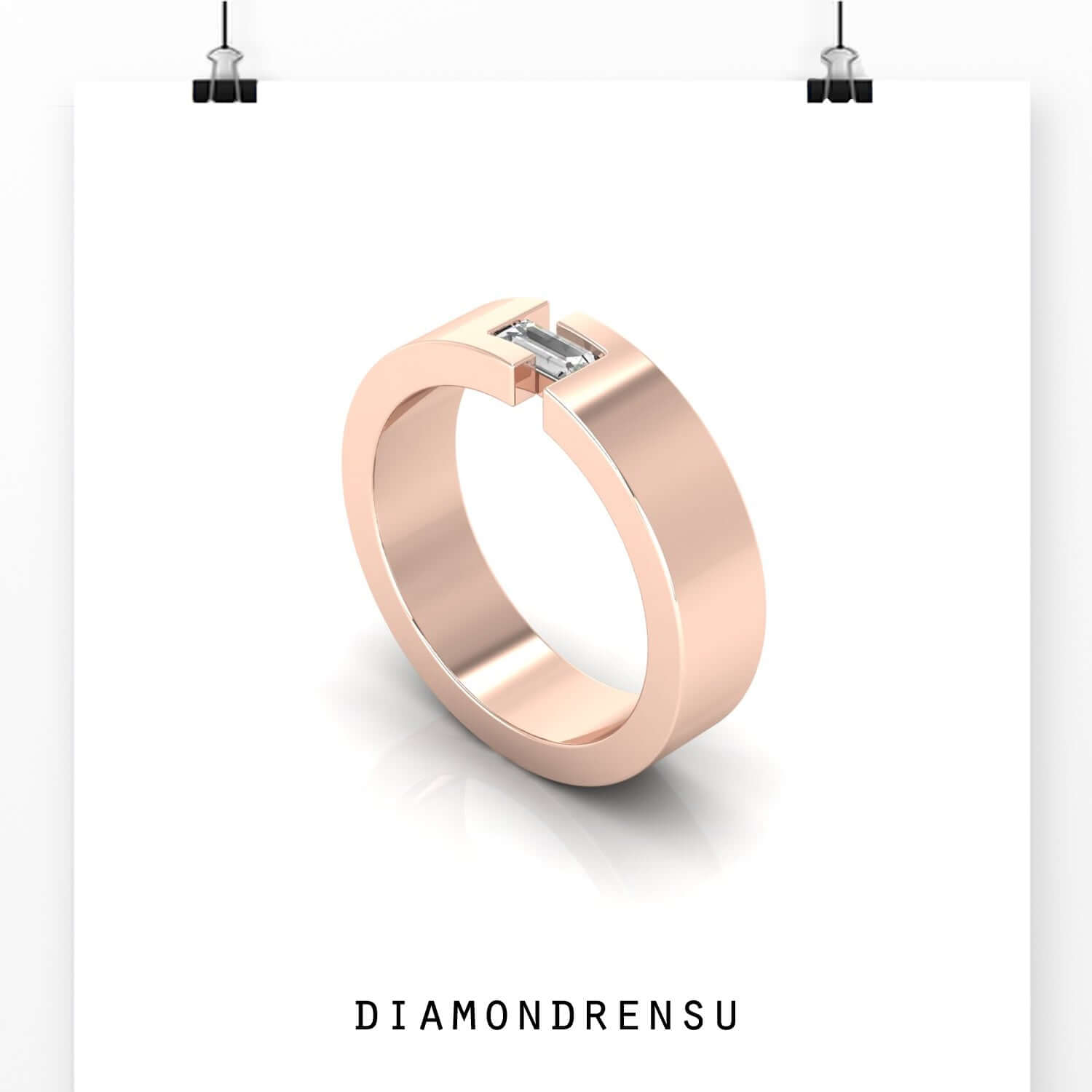 Gold baguette diamond ring in open band setting with rose gold finish.