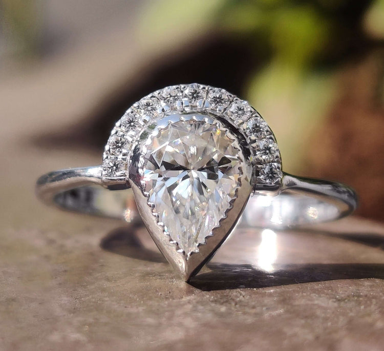Vintage Engagement Ring with a stunning vintage moissanite ring design.