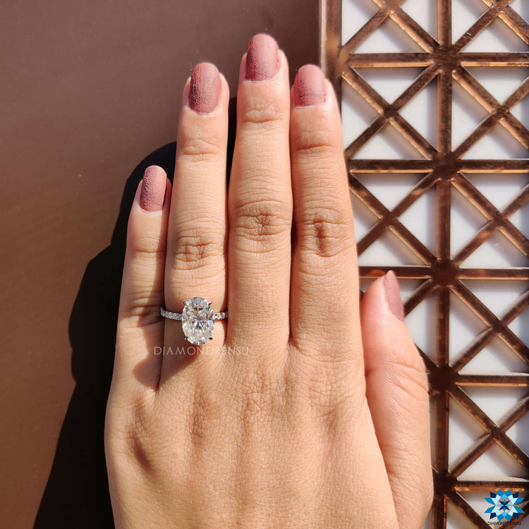 Buy moissanite ring with pave setting and halo style.