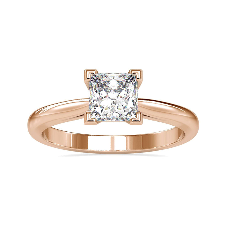 Princess cut solitaire engagement ring in white gold with 4 prong setting.