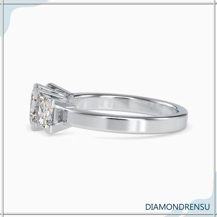 White gold ring with four prong setting and princess cut diamond.