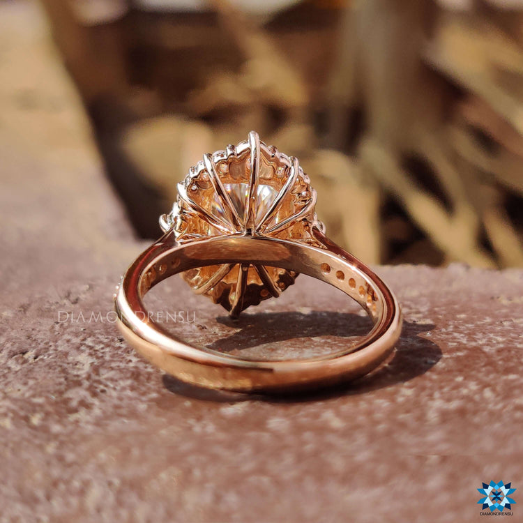 Radiant moissanite ring crafted in a cathedral style setting.