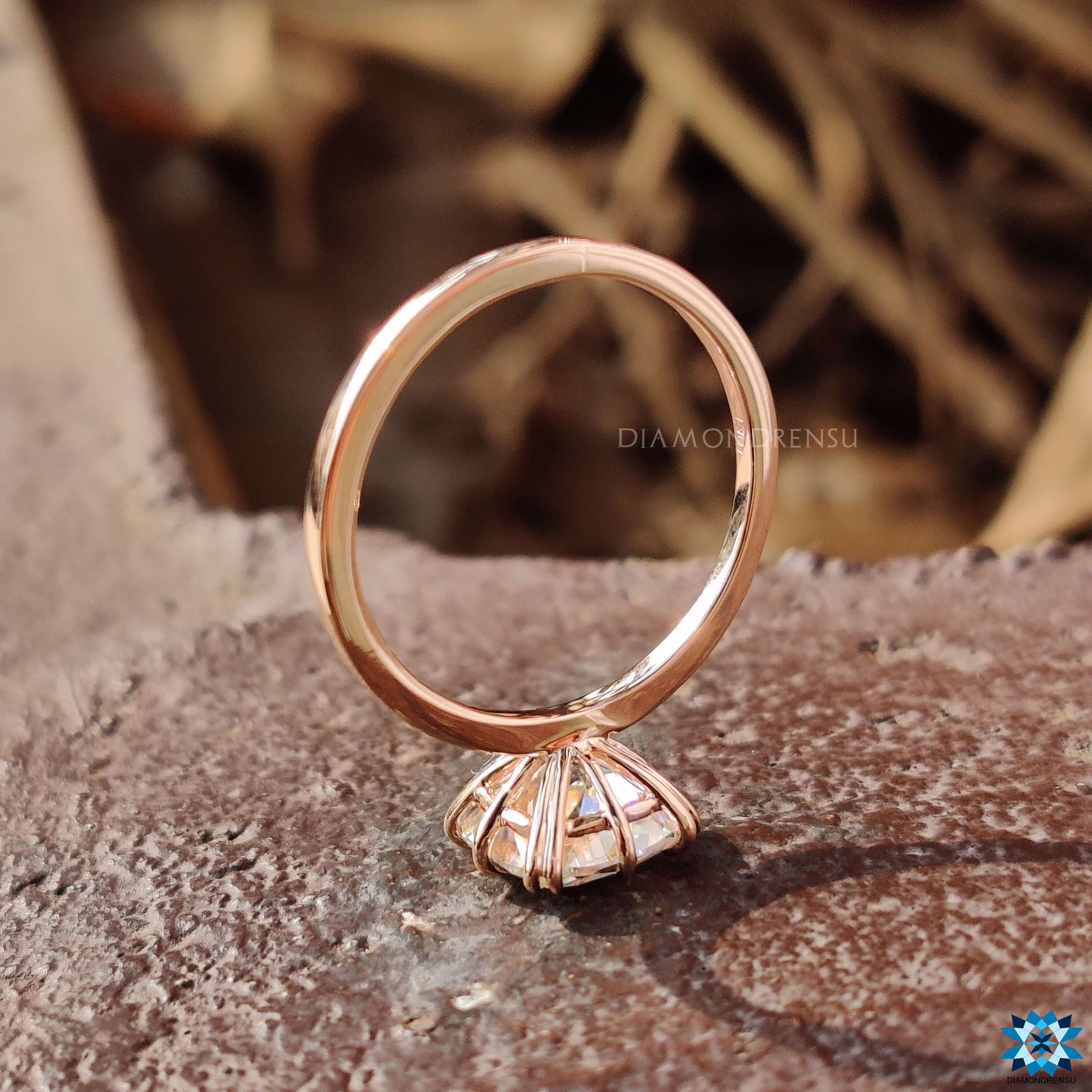 Moissanite engagement ring in solitaire design.