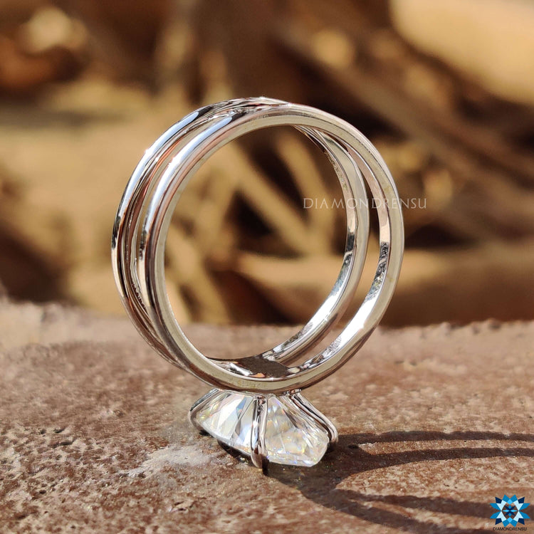 Custom moissanite engagement ring with marquise center stone.