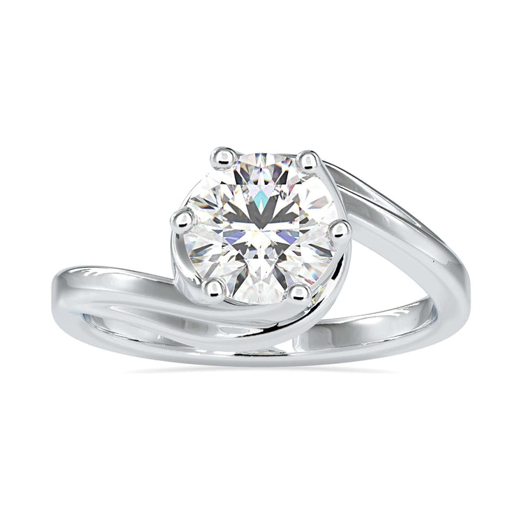 Designer ring with round solitaire diamond and bypass style.