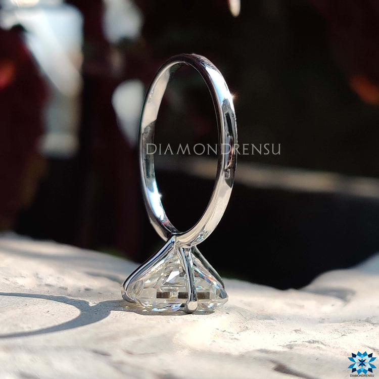 Custom handmade moissanite solitaire ring.
