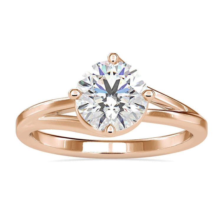 Unique solitaire engagement ring with round cut, handmade in the UK.