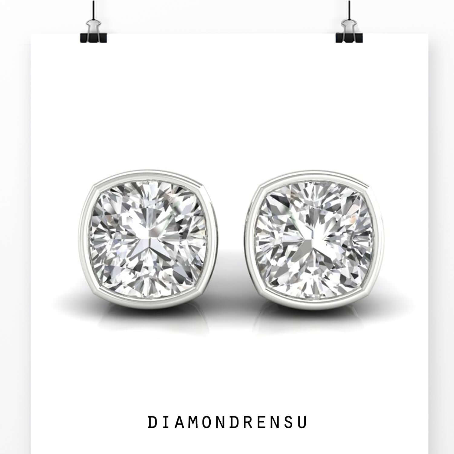 Cushion cut diamond earrings crafted in white gold.