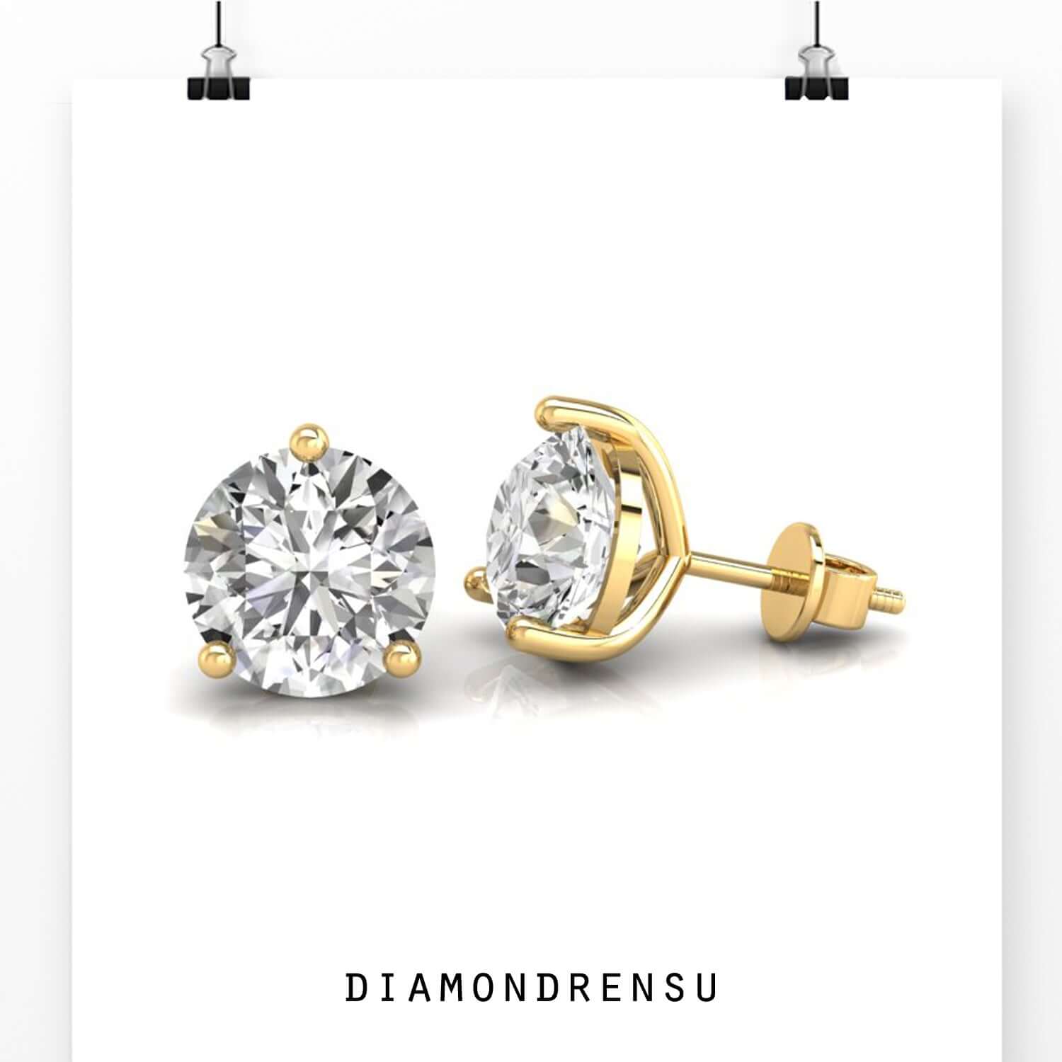 White gold diamond stud earrings with round cut stones and secure 3 prong setting.