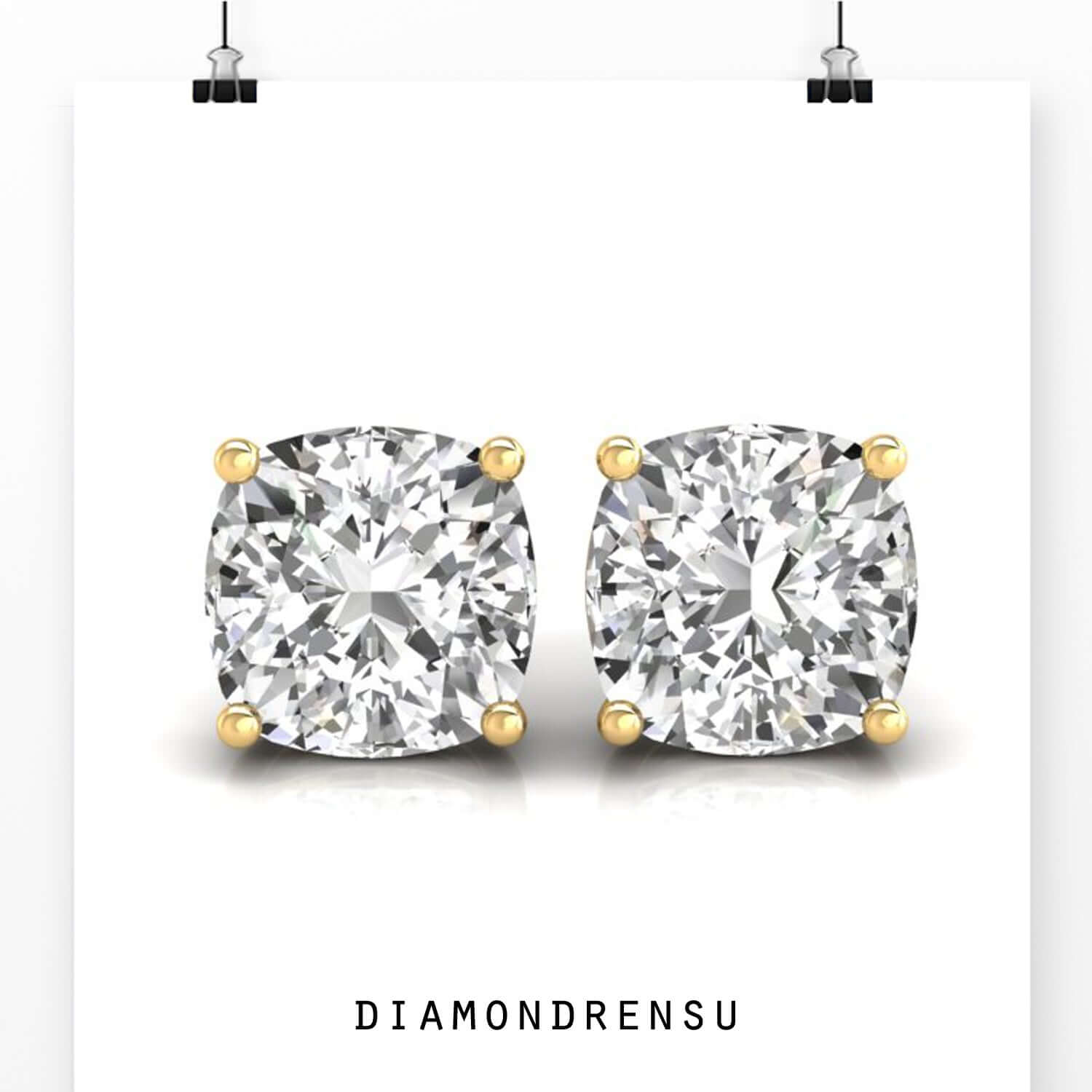 Gold stud earrings featuring lab grown diamonds.