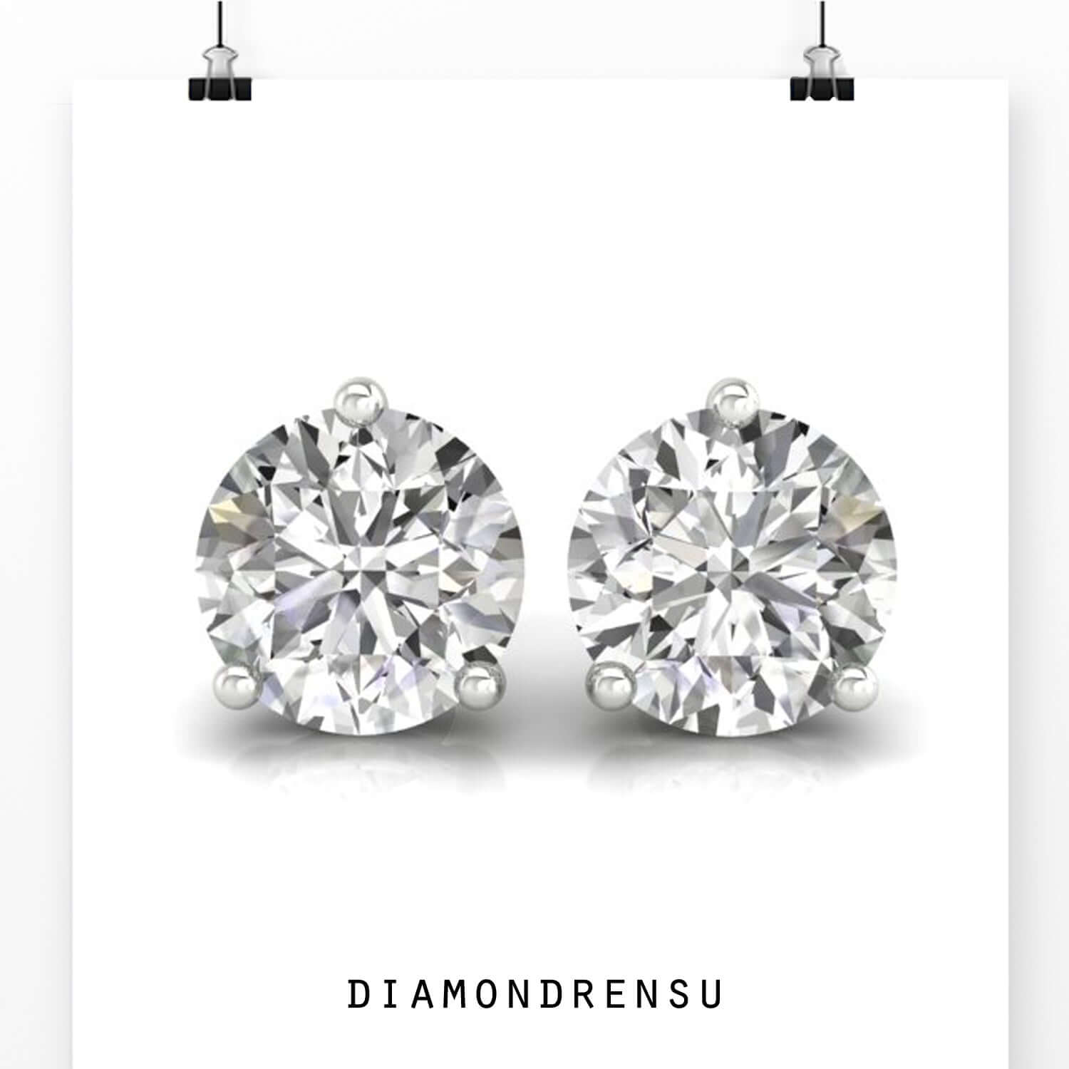 Lab grown diamond earrings with round cut stones and 3 prong setting in white gold.