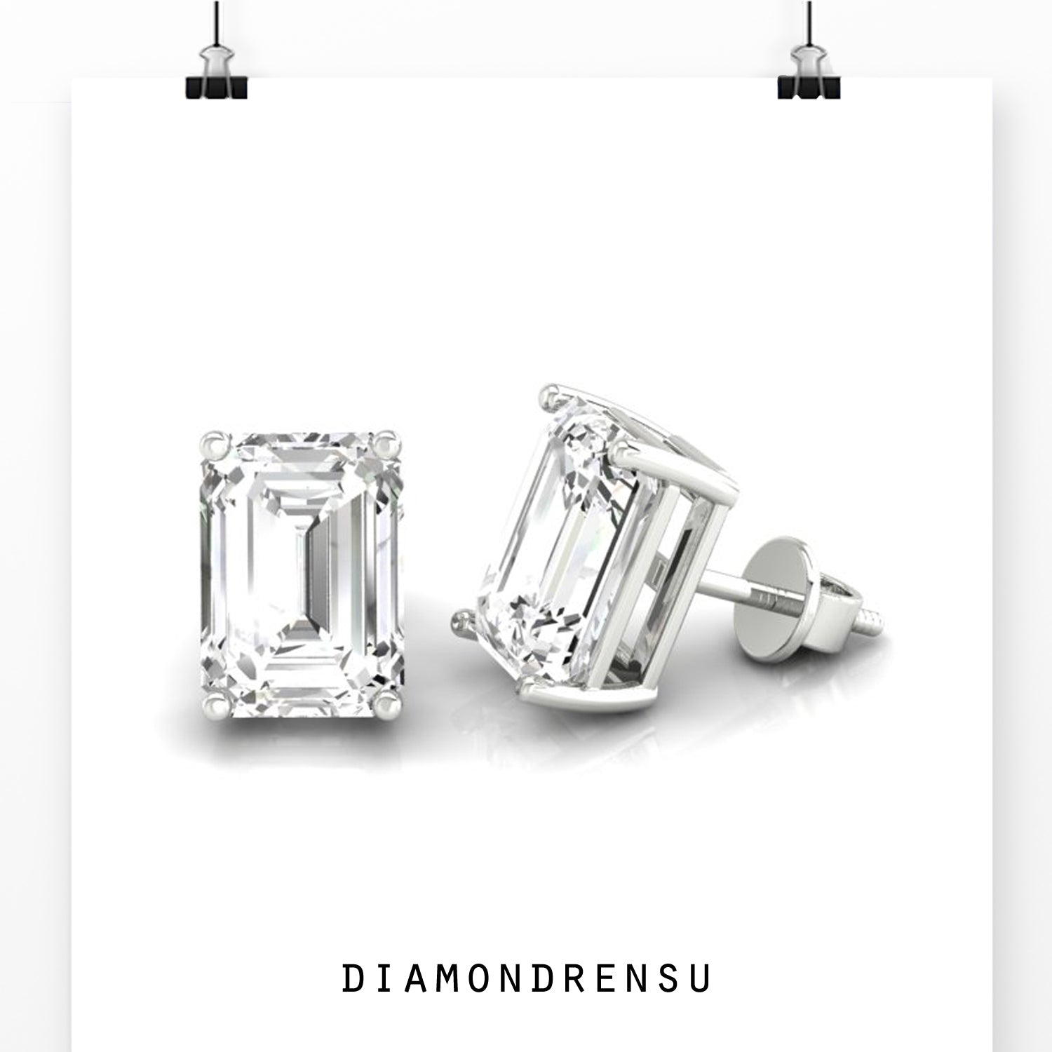 White gold diamond stud earrings with emerald cut stones and screw back closure.