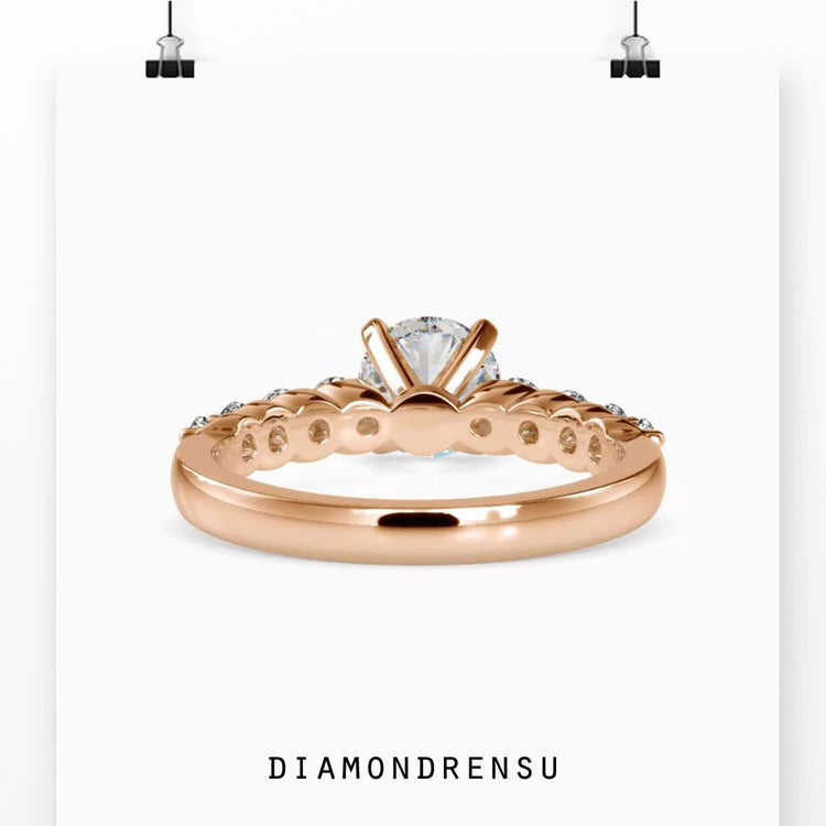 UK diamond ring featuring round brilliant lab grown diamond.
