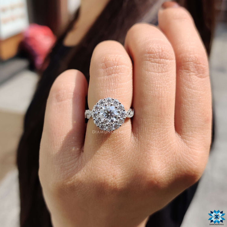 Round cut moissanite ring in white gold.